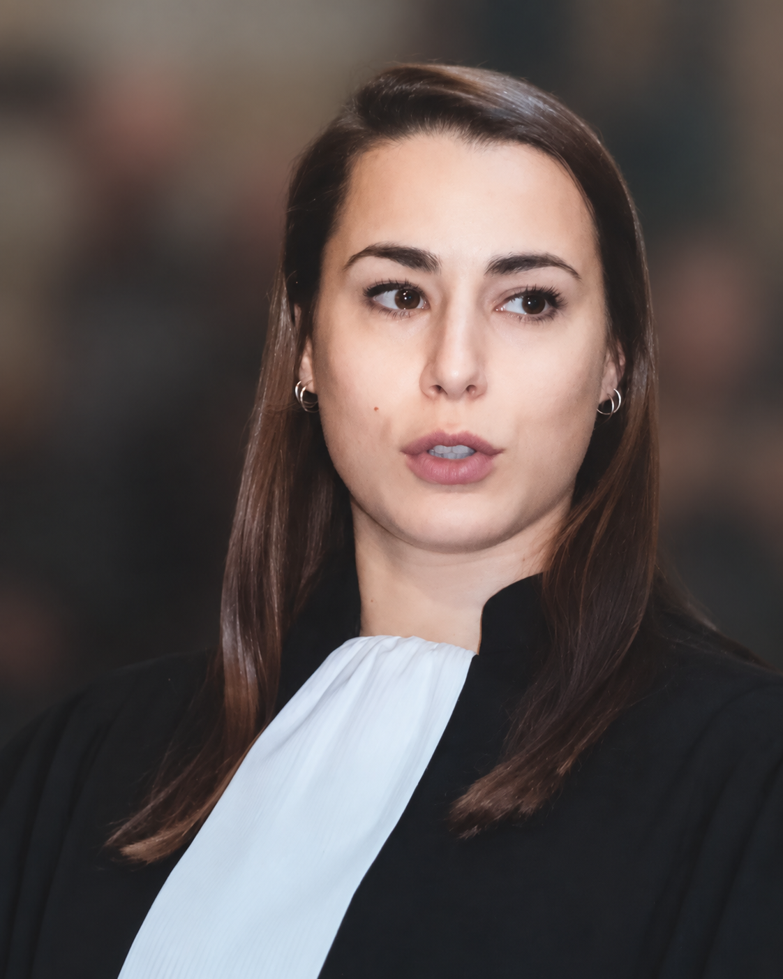 Maeva in her lawyer’s robe. Portrait option for private review.